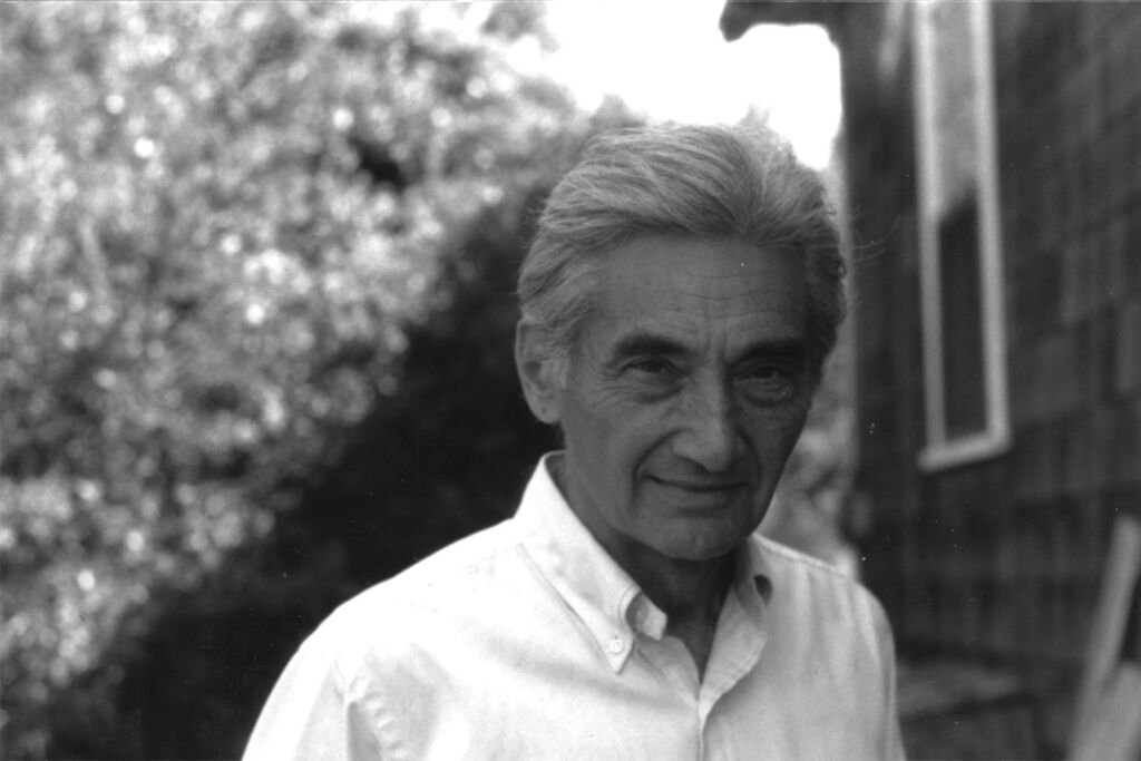 Howard Zinn looking at camera serious