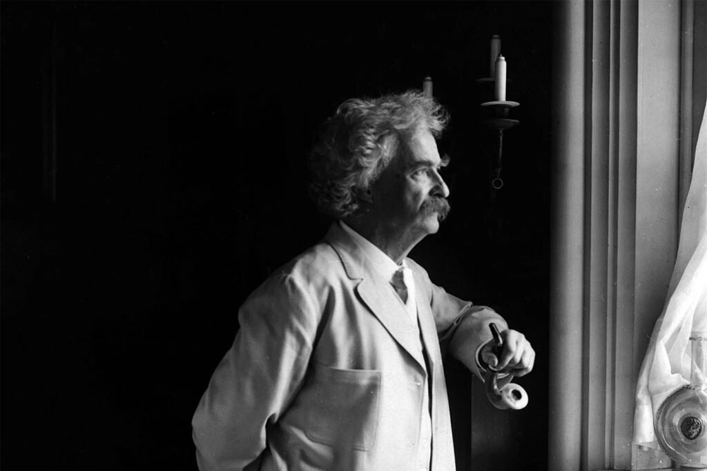 Mark Twain looking out of window